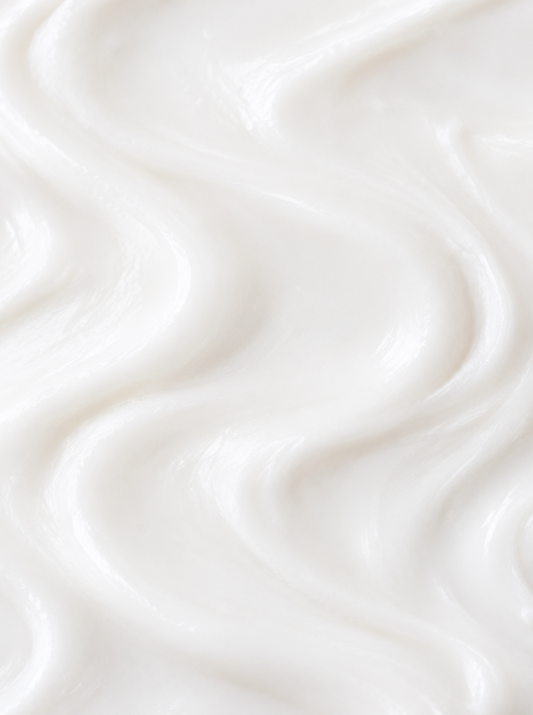 Swirled white cream texture of VMEN’S 3-in-1 Curly Hair Treatment for Men.