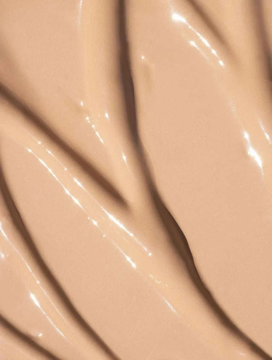 Creamy texture of the Correcting Concealer for Men in shade 15 Medium Cool, displaying smooth, skin-like coverage.