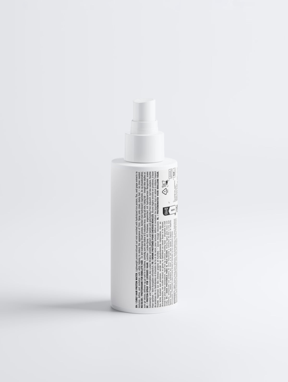 Back label of VMEN’S CURL CARE Texture Mist for Men, showing multilingual product information and directions.