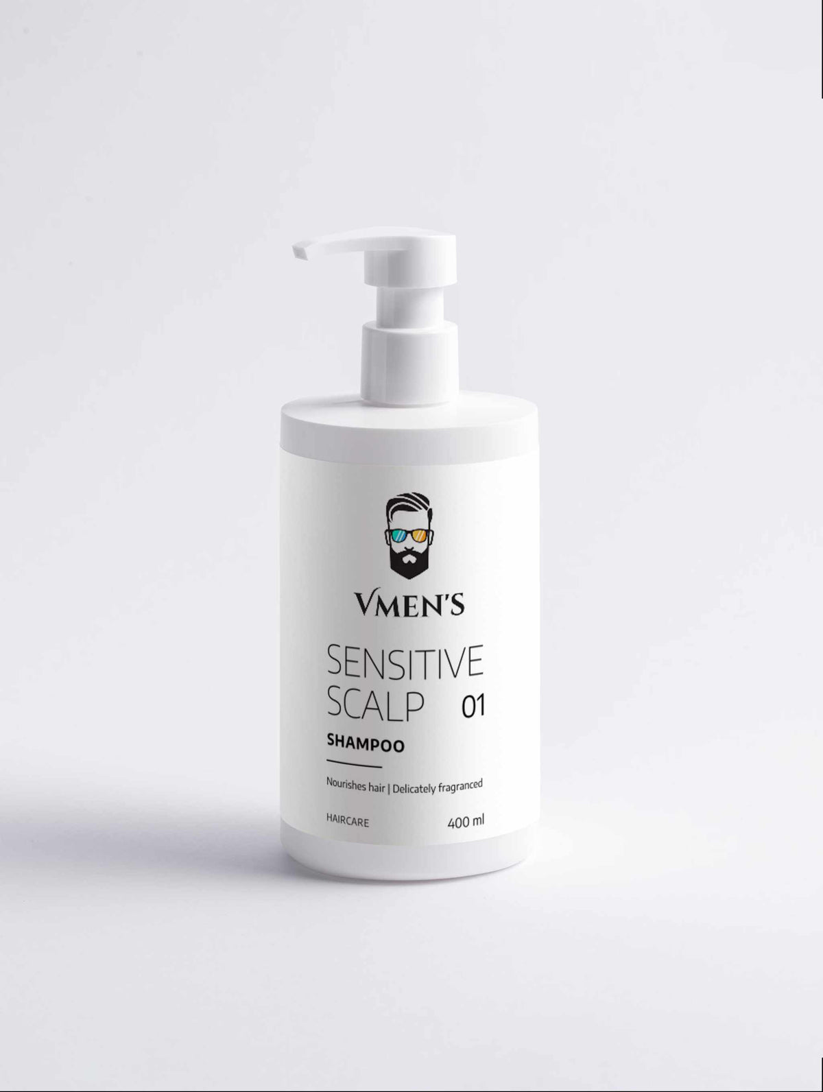 Front view of the white VMEN’S Sensitive Scalp 01 Shampoo pump bottle.