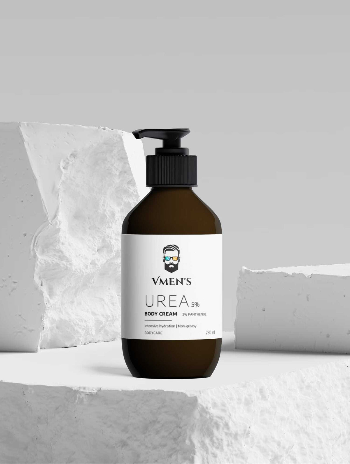 VMEN’S 5% Hydroxyethyl Urea + 2% Panthenol Body Cream displayed among white stone blocks.