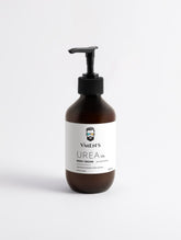 Front view of VMEN’S 5% Hydroxyethyl Urea + 2% Panthenol Body Cream in a brown pump bottle.