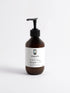 Front view of VMEN’S 5% Hydroxyethyl Urea + 2% Panthenol Body Cream in a brown pump bottle.