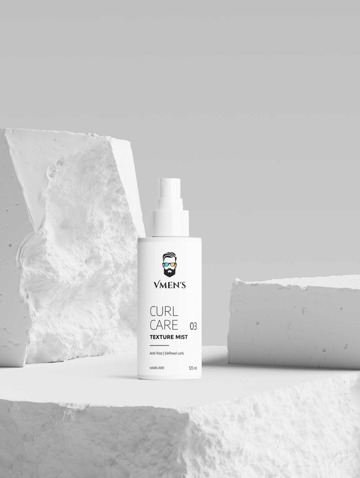 White spray bottle labeled "VMEN&