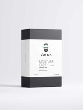 Front view of the VMEN’S Shiny Hair Duo presentation box with its white Moisture Care sleeve.