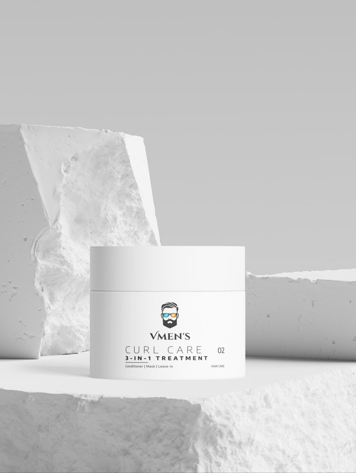 VMEN’S 3-in-1 Curly Hair Treatment for Men displayed among textured white blocks.