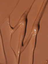 30 Tan Neutral Correcting Concealer in a creamy, smooth texture, featuring a warm, medium brown shade.