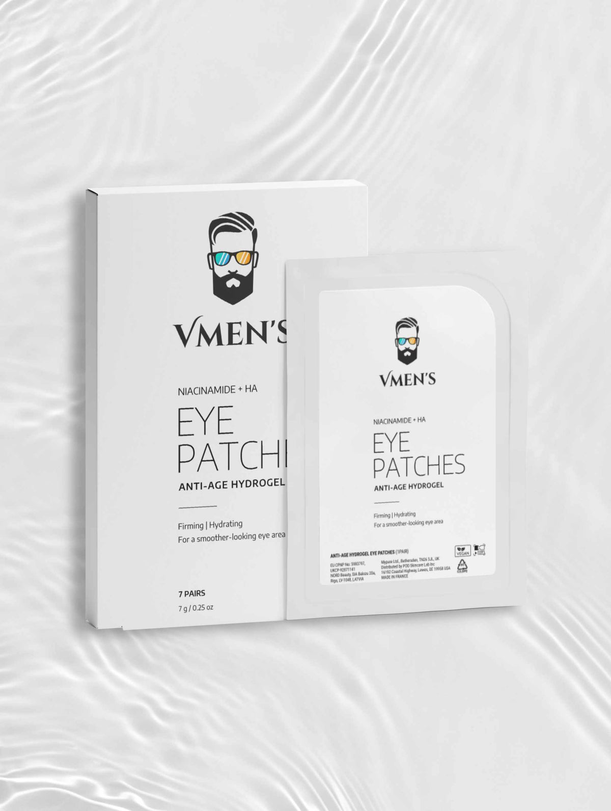 VMEN’S Anti-Age Hydrogel Eye Patches for Men box and sachet on a white background with rippling light.