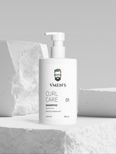 VMEN’S Curly Hair Shampoo for Men displayed among textured white blocks.
