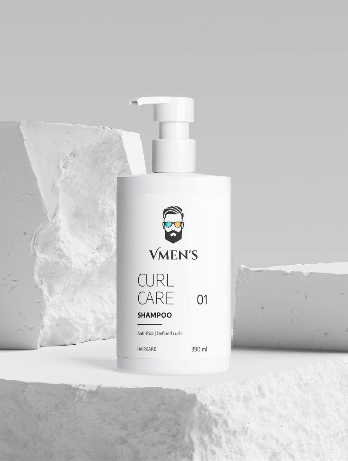 VMEN’S Curly Hair Shampoo for Men displayed among textured white blocks.