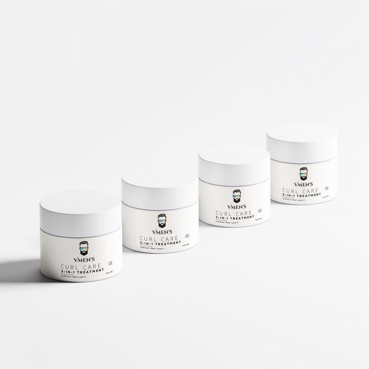 Four white jars of VMEN’S 3-in-1 Curly Hair Treatment for Men arranged in a row.