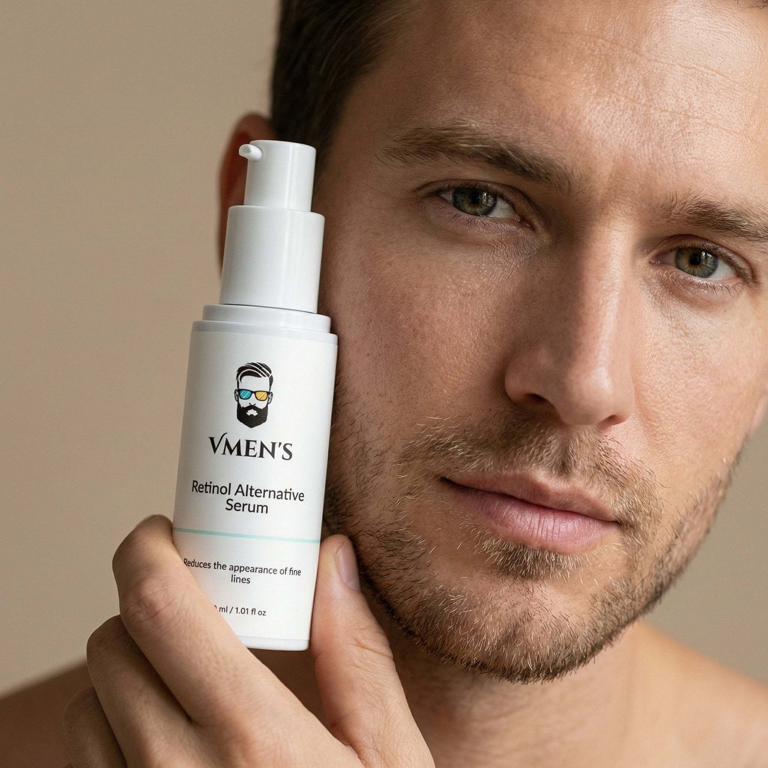 Man holding a bottle of VMEN&